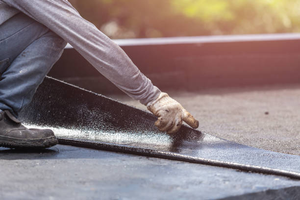 Professional Basement Waterproofing technician working in Mulliken, MI